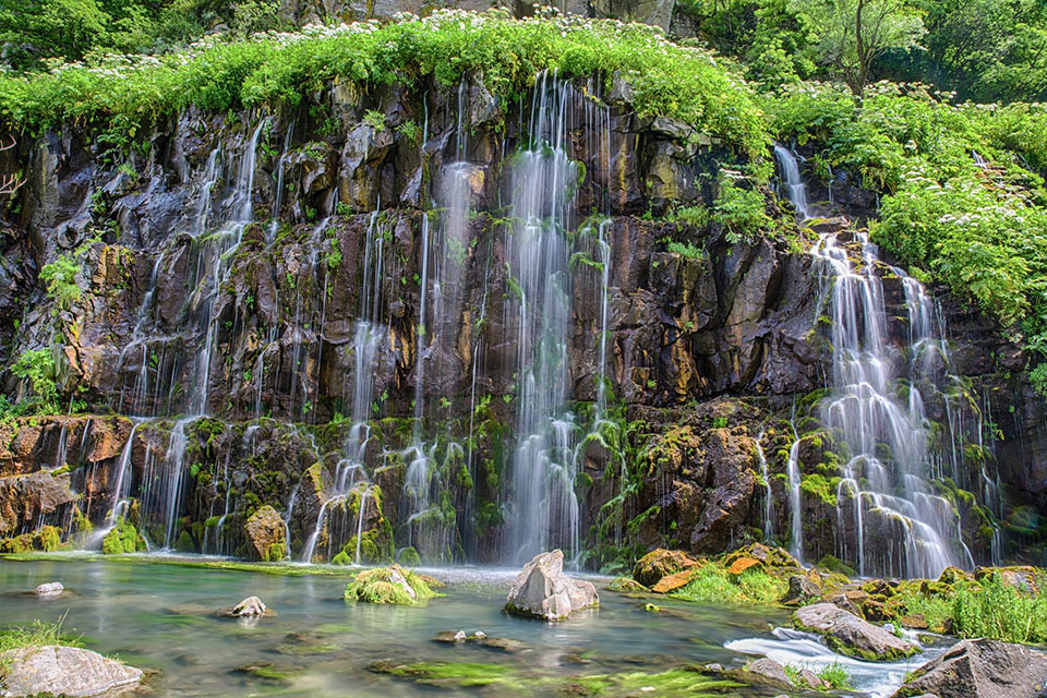 Waterfall cascading into Dashbashi Canyon